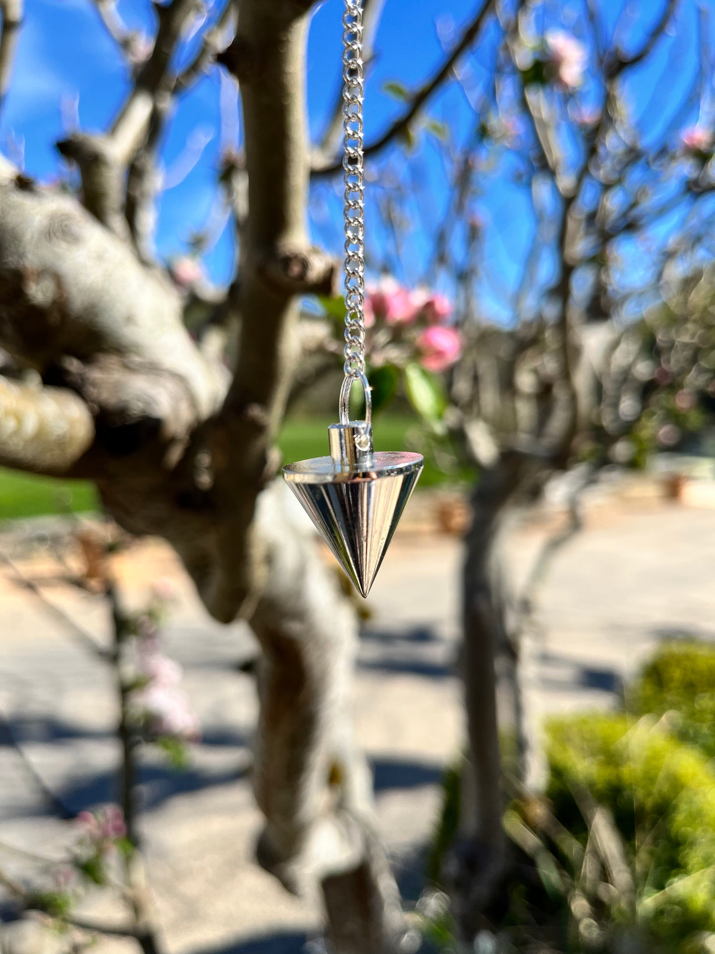 Pendule conique bain d’argent